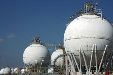 white  tanks of big crude oil refinery