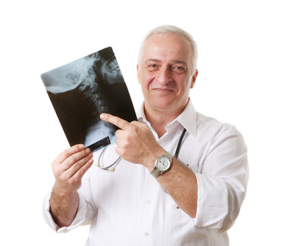Friendly mature doctor chiropractor, human neck x-ray