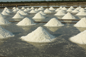 Salt evaporation pond, salt pile in Thailand, salt pan.