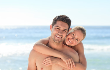Fototapeta premium Joyful couple at the beach