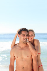 Fototapeta premium Enamored couple at the beach