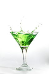 Fototapeta na wymiar green martini cocktail splashing