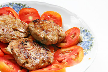 Pork and onion HamBurger with Red slced Tomato