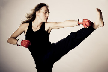 Girl with boxing gloves