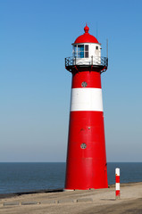 Red lighthouse in Zeeland, Netherlands