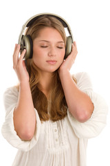 Naklejka premium Teenage girl listening to music