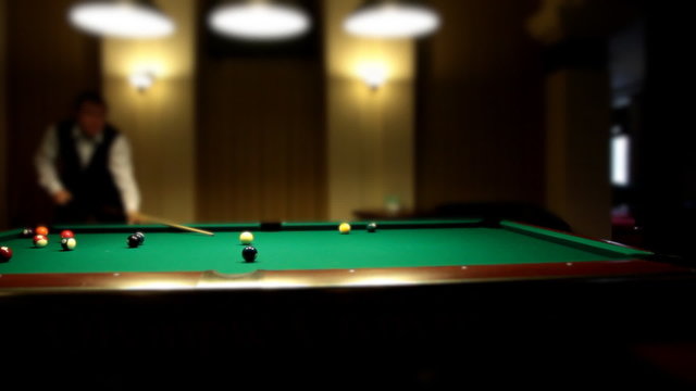 Pool game blow on ball