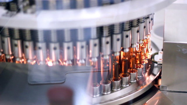Pharmaceutical Equipment. Automatic Optical Inspection Machine For Ampoules, Vials And Cartridges. Inspects Ampoules For Particulates In Liquid And Container Defects. Vaccine Manufacturing.