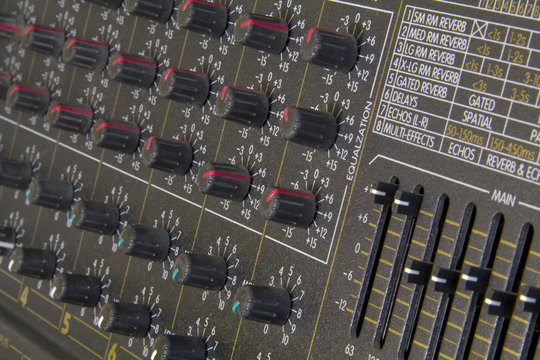 Close up of amplifier buttons and knobs