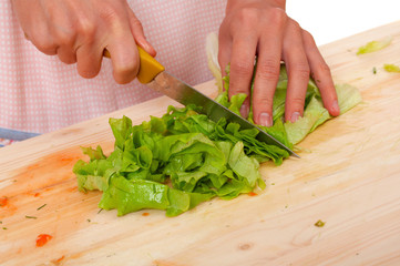 housewife preparing leaf lettuce