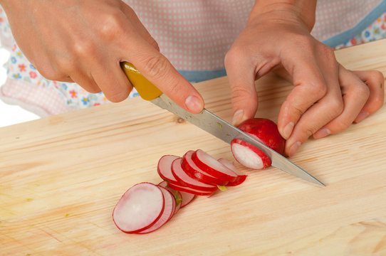 housewife preparing  small radish