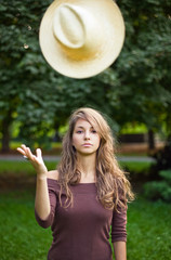Fototapeta premium Beautilful young brunette posing outdoors.
