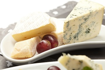 Cheese plate with grapes