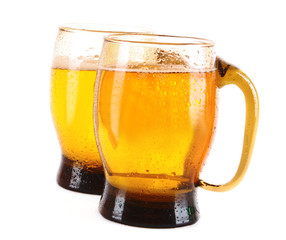 Mugs of beer isolated on white
