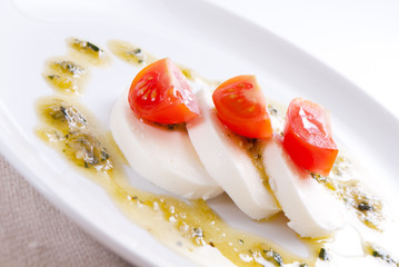 Mozzarella salat with pesto sauce