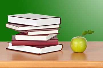 Books and apple