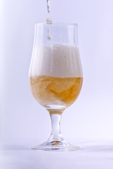filling a glass of beer