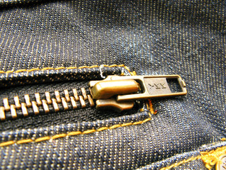 metal zip on jeans close up