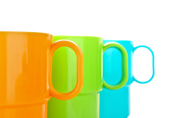 Cups in row isolated on white