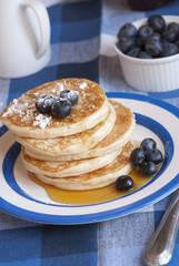 Pancakes with blueberries and syrup
