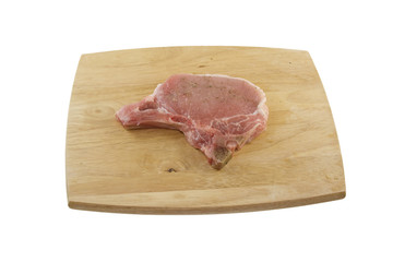 fresh porkchop on cuttingboard