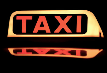Close up of A Taxi sign