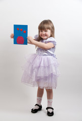 Young girl shows her picture