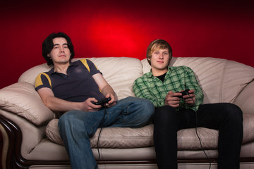 two friends playing video games