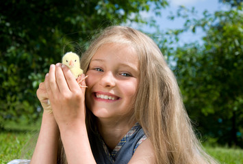 Little girls with chicken