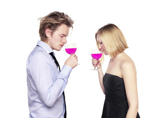 Young couple toasting with pink drink