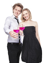 Young couple toasting with pink drink
