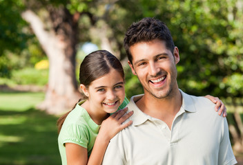 Obraz premium Daughter with her father in the park