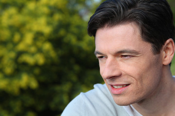 Fototapeta premium Portrait of handsome smiling man