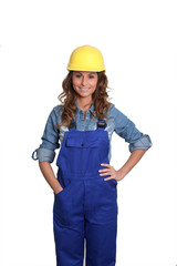 Woman with security helmet standing on white background