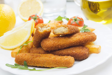Breaded fish sticks with french fries