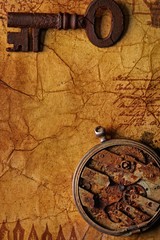 The old key with a gears on the old textured paprer
