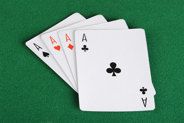 Four ace playing cards