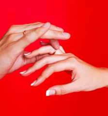 hands of a bride and a groom