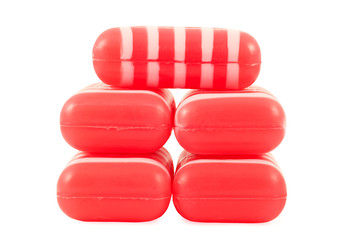 stack of striped soaps isolated on white