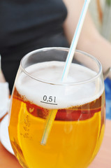 Beer in clear glass with bubbles, alcohol
