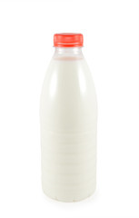 Milk in bottle isolated on white