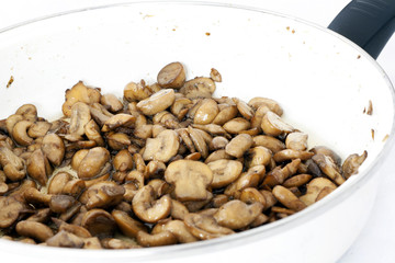 Fried mushrooms in pan