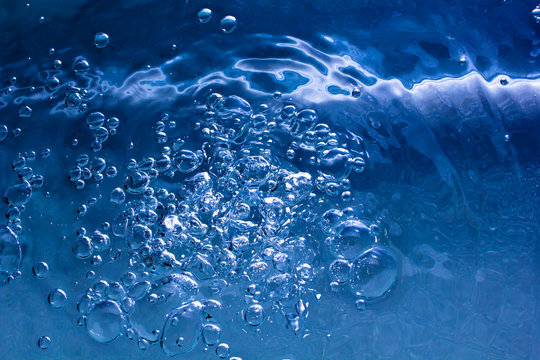blue water with bubbles and  drops background