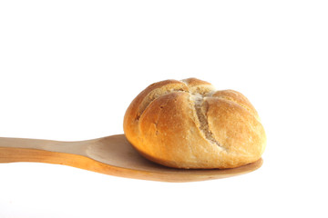 Bun on a wooden spoon