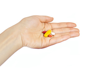 Woman hand holding supplements