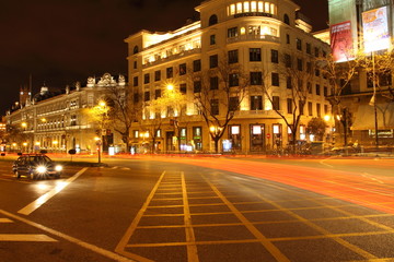 Fototapeta na wymiar Gran via street in Madrid, Spain at night