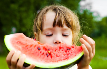 girl eating watermelon