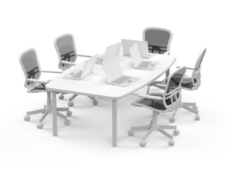 Conference table with laptops