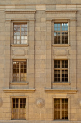 Fototapeta na wymiar Old windows in stone building
