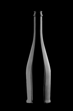 Champagne bottle silhouette against black